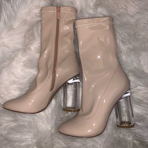 Tan patent boots with clear heel